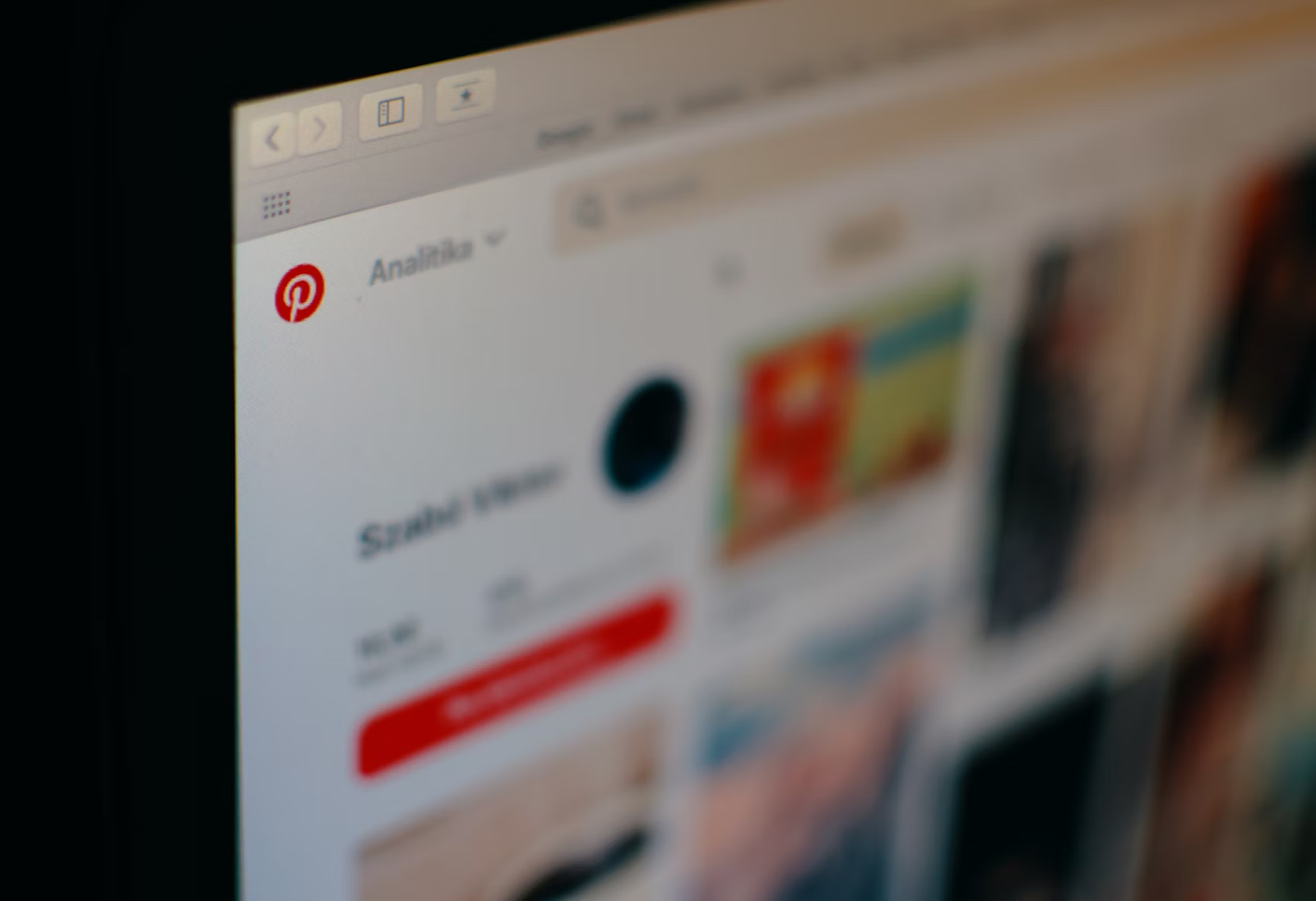 Laptop displaying the Pinterest site with a half-blurry effect, suggesting focus on visual inspiration and digital discovery