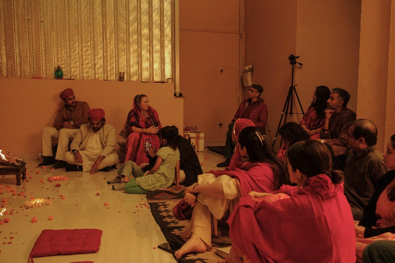 A group of people sitting in a circle

AI-generated content may be incorrect.