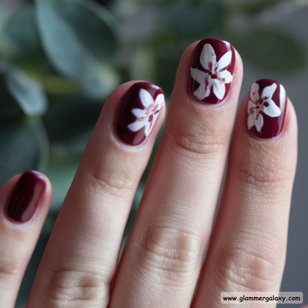 Burgundy fall Nails with Elegant Floral Designs