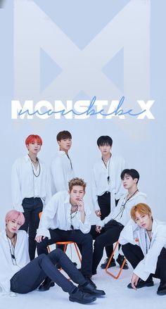 This contain an image of  the members of monsta x posing for a photo in front of a white background