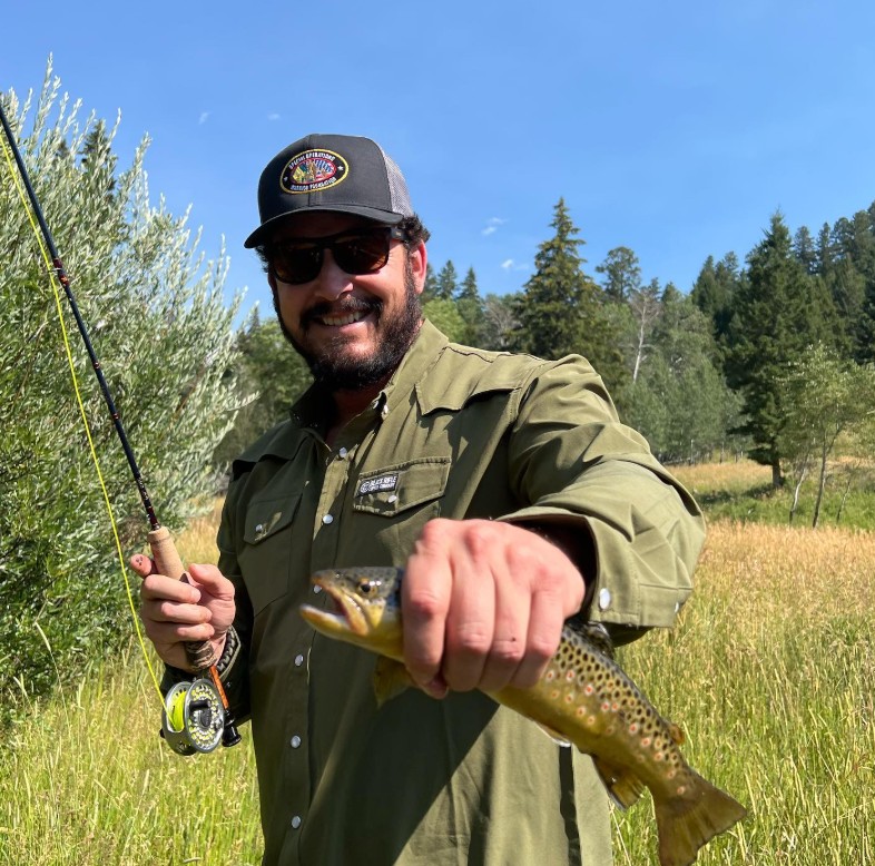 May be an image of 1 person, fishing and fishing rod