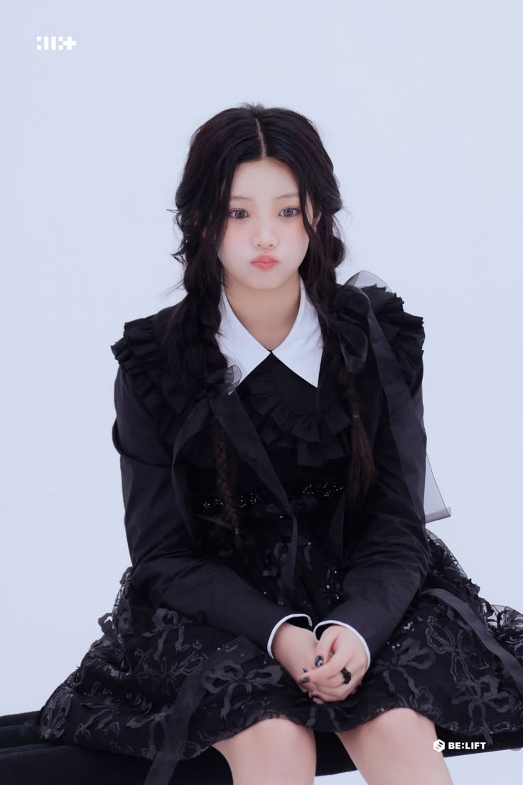 This contains an image of ILLIT Wonhee