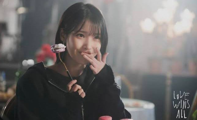This contains an image of IU "Love wins all"