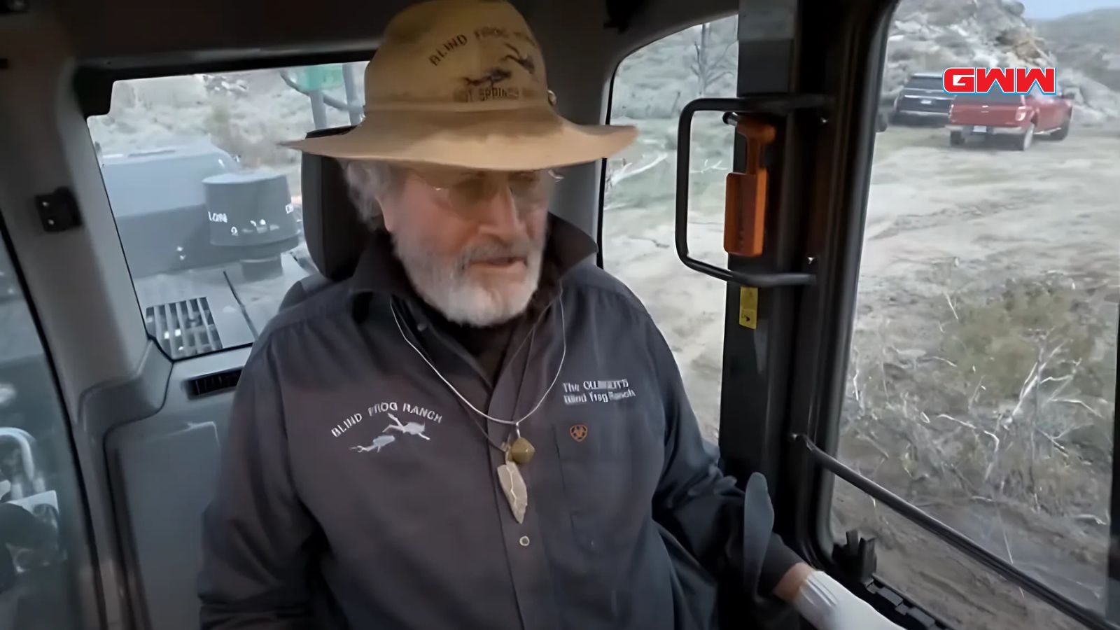 Duane Ollinger in heavy machinery overlooking Blind Frog Ranch excavation site