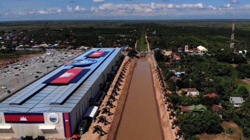 An aerial view shows heavy construction equipment lining the edge of the canal after a groundbreaking ceremony for the Funan Techo Canal in Kandal province on August 5, 2024.