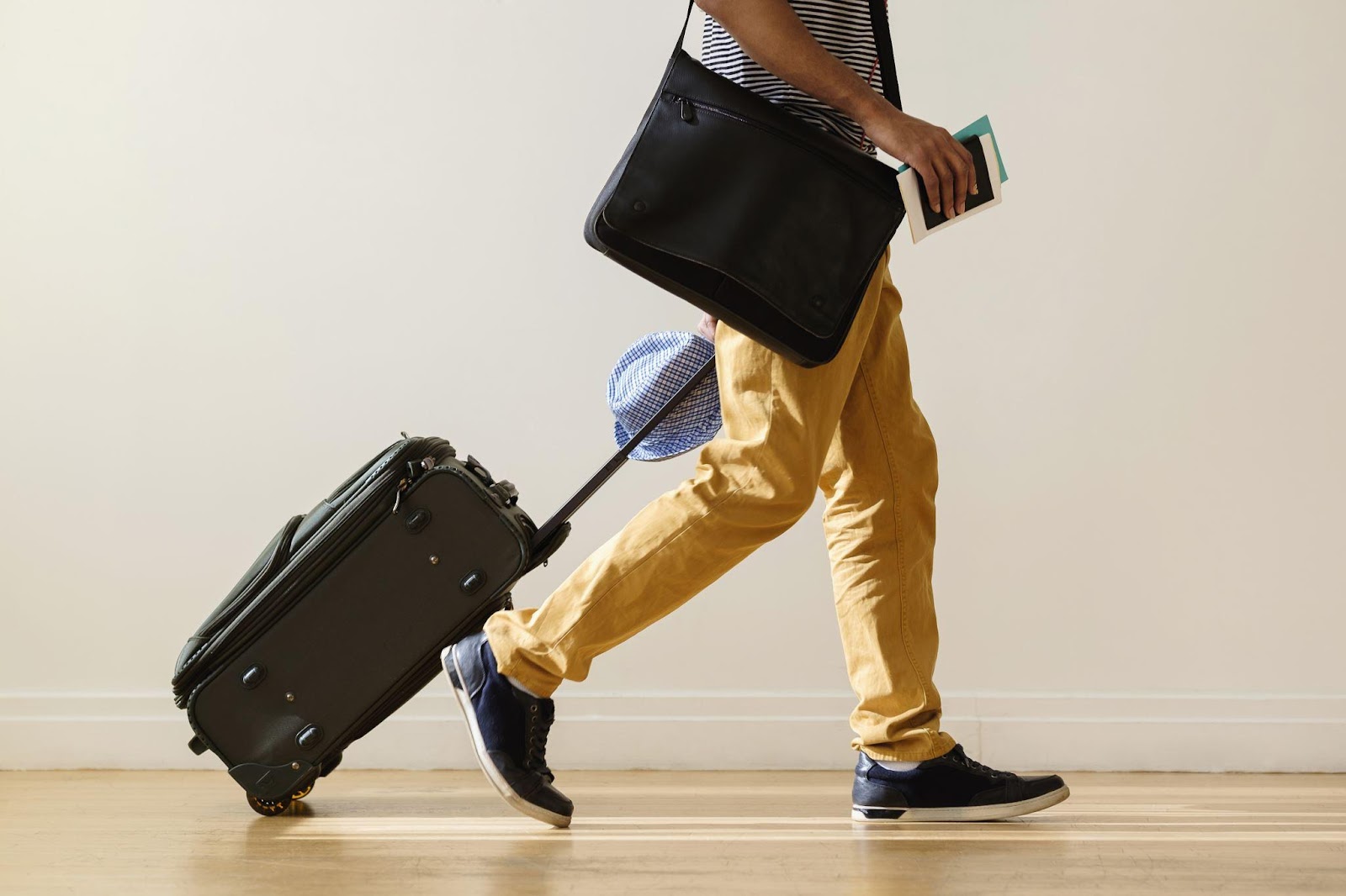 Person rolling luggage