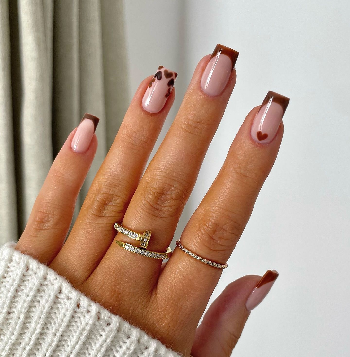 Close-up of hands with fall nail design having Fall-Colored Tips