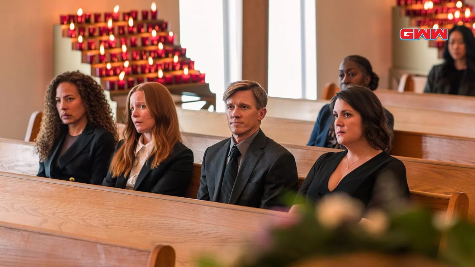 Tawny Cypress, Lauren Ambrose, Warren Kole, and Melanie Lynskey in Yellowjackets Season 3