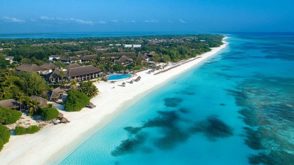 trip to Zanzibar beach with dhow boats and blue water