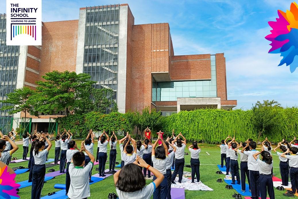 Students doing yoga in The Infinity School