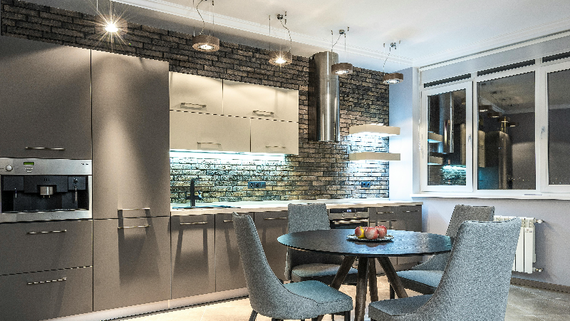 modern kitchen with bright lights under the cabinets 