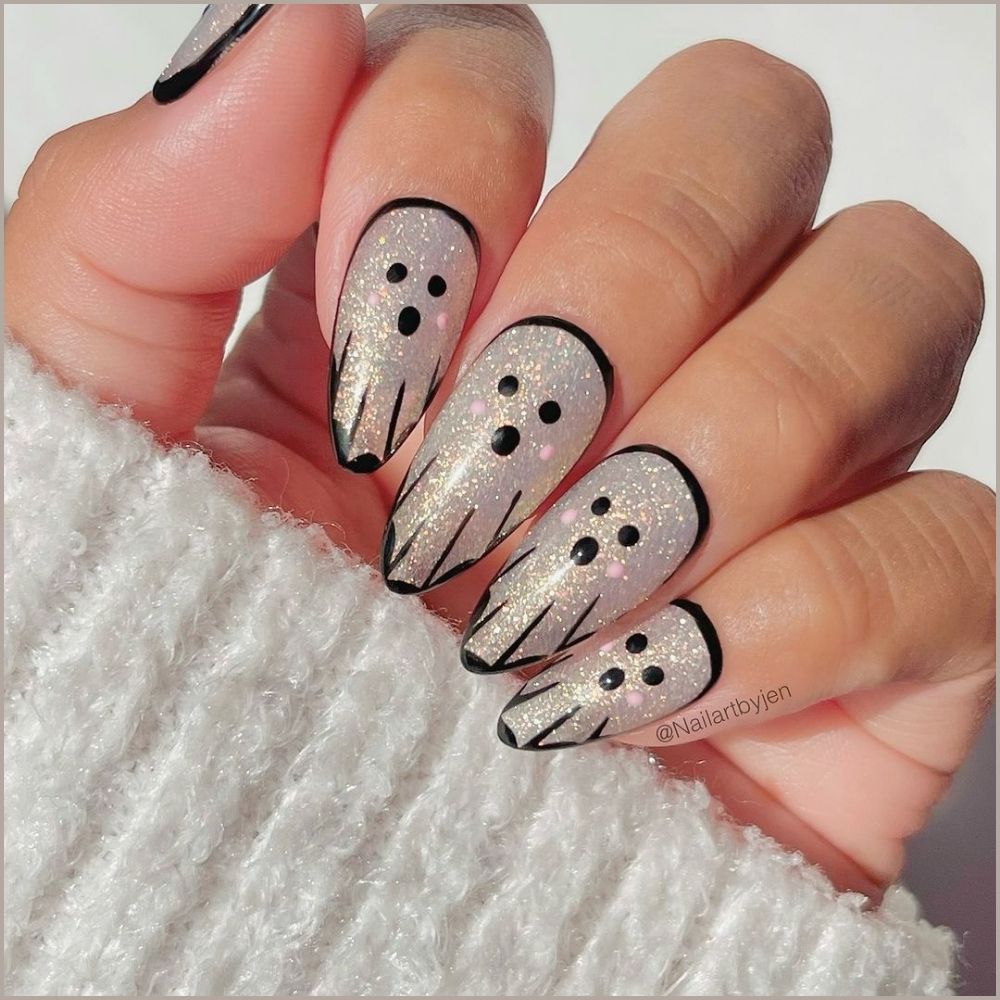 Close up of nails with spooky nails having Sparkly Halloween Nails