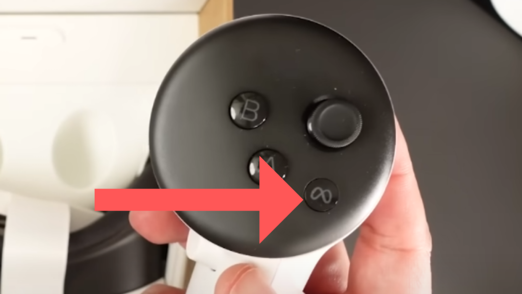 Right controller with Meta button highlighted to pair Meta Quest 3 Controllers