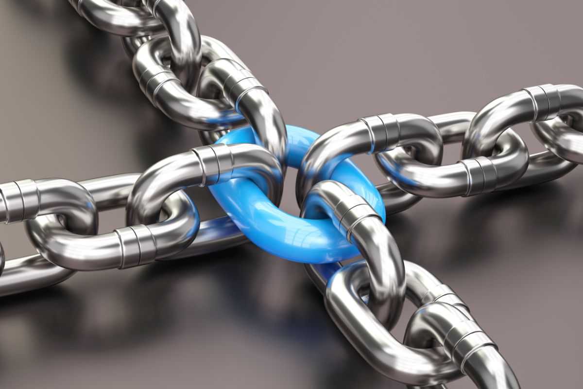 a blue link is connected to a chain