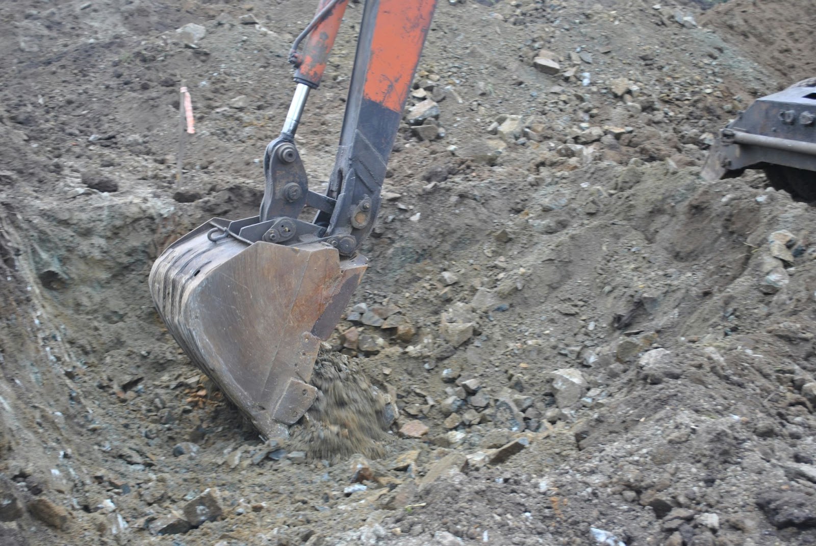when to choose a skid steer over an excavator