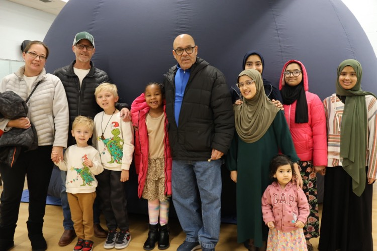 Windsor Public Schools families wait anxiously to experience the immersive show alongside their children during the Winter Wonderland event. 