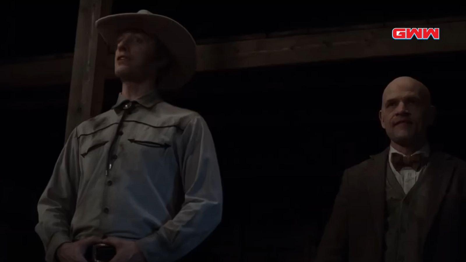 Two mysterious men in a dark setting, highlighting tension in "From" Season 3