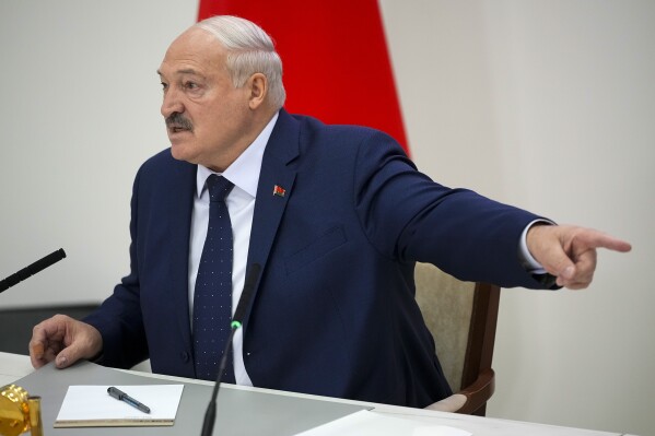 Belarusian President Alexander Lukashenko gestures while speaking to the media after voting in a presidential election in Minsk, Belarus, Sunday, Jan. 26, 2025. (AP Photo/Pavel Bednyakov, File)