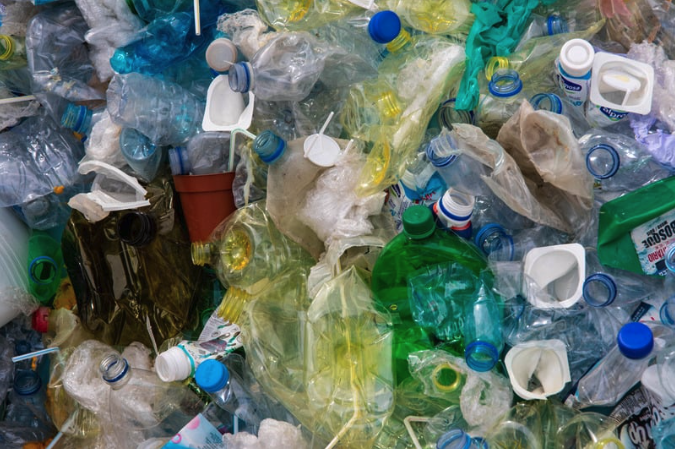 A pile of various single-use plastic containers