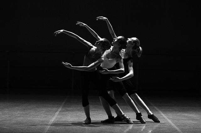 A group of women dancing

AI-generated content may be incorrect.
