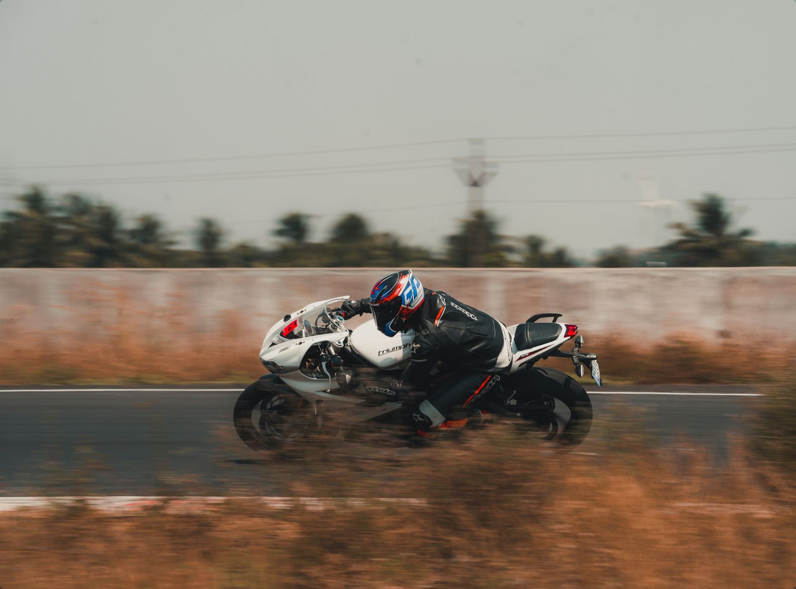 Man riding on motorcycle - Unsplash License,