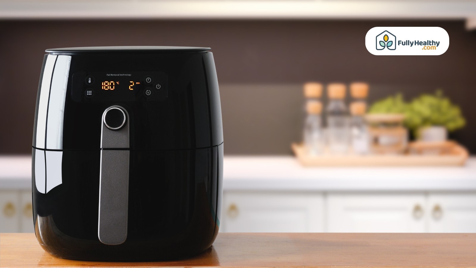 Modern air fryer sitting on kitchen countertop background