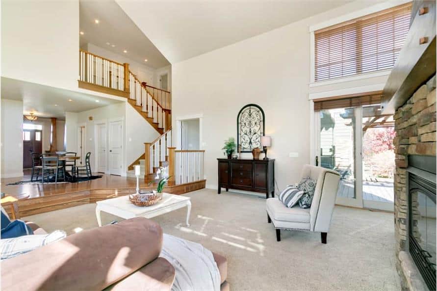 A soaring vaulted ceiling crowns the living room.