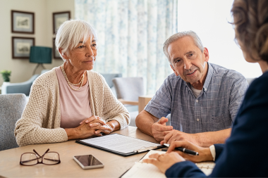 is a full house remodel worth it how to decide if its right for your family elderly couple talking to remodeler about budget custom built michigan