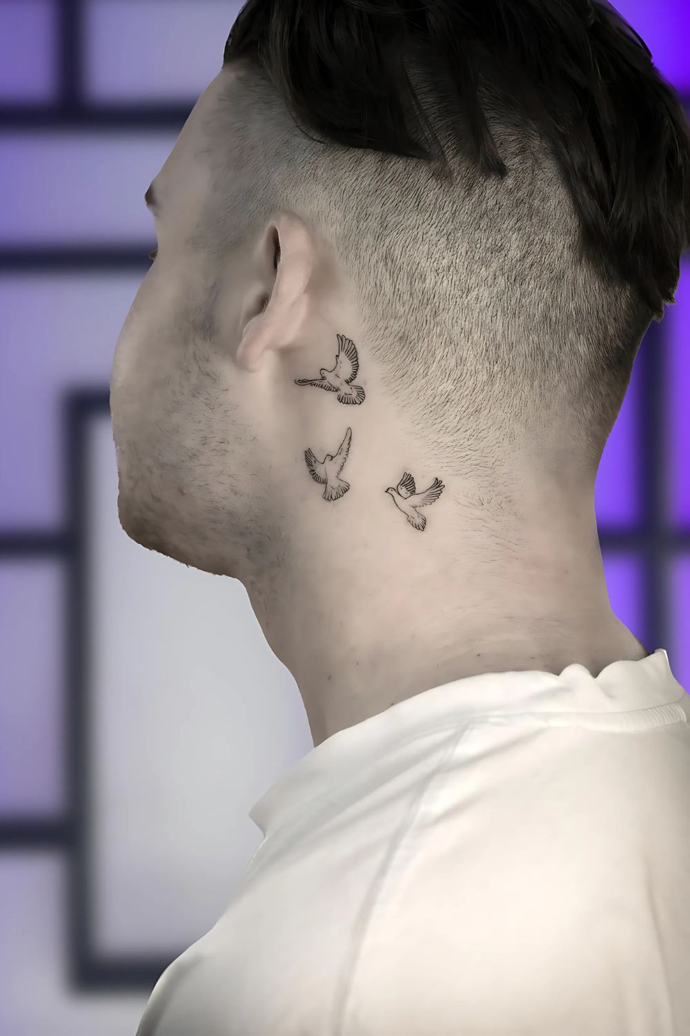 Free-Spirited Bird Neck Tattoo