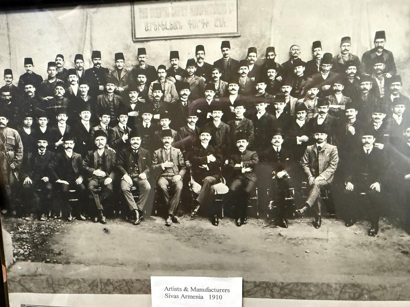 A group of men posing for a photo

AI-generated content may be incorrect.
