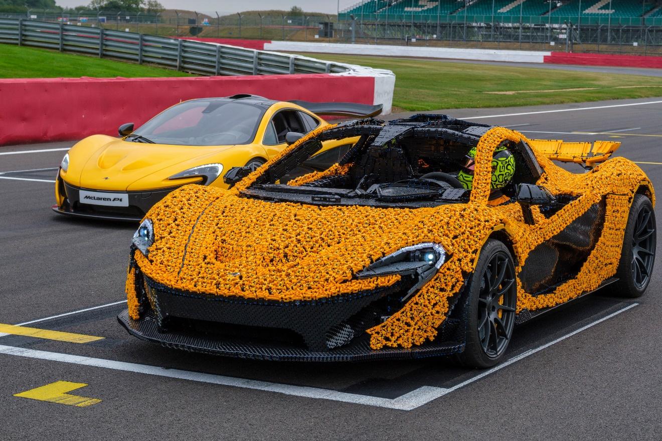 Image of the real McLaren P1 and the lifesize LEGO Technic McLaren P1 big build on Silverstonetrack