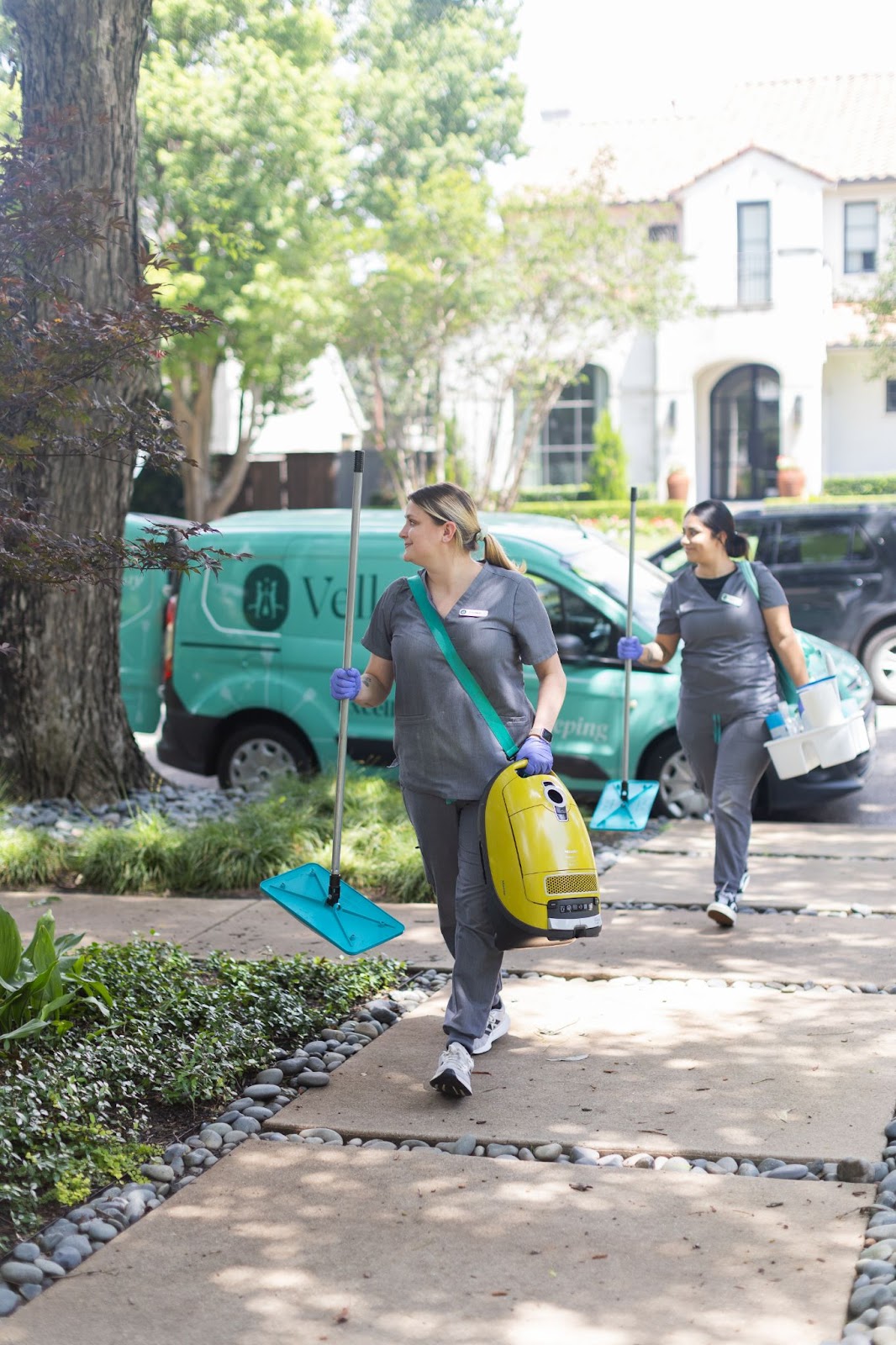 Vella housekeepers going for cleaning the property with equipments