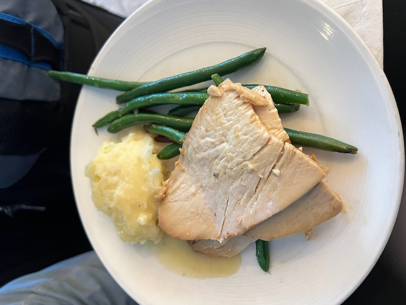 Turkey, mashed potatoes, and green beans served at the buffet in the United Polaris lounge on Thanksgiving day. 