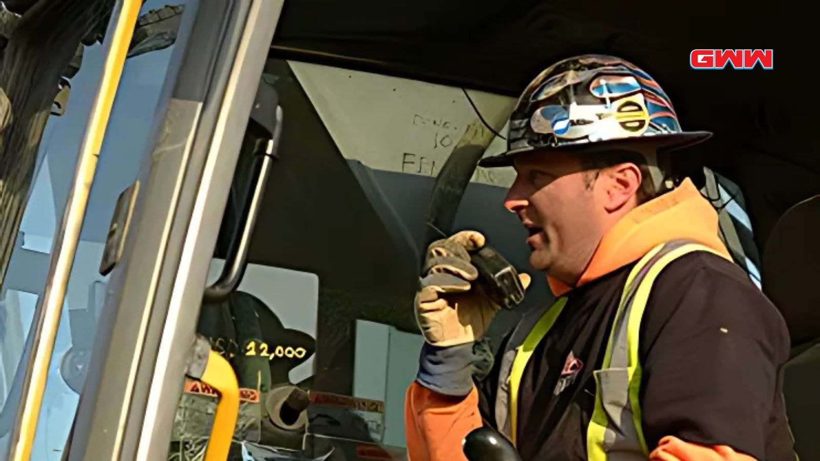 Rick Ness, a Gold Rush cast member, uses a radio at a mining site