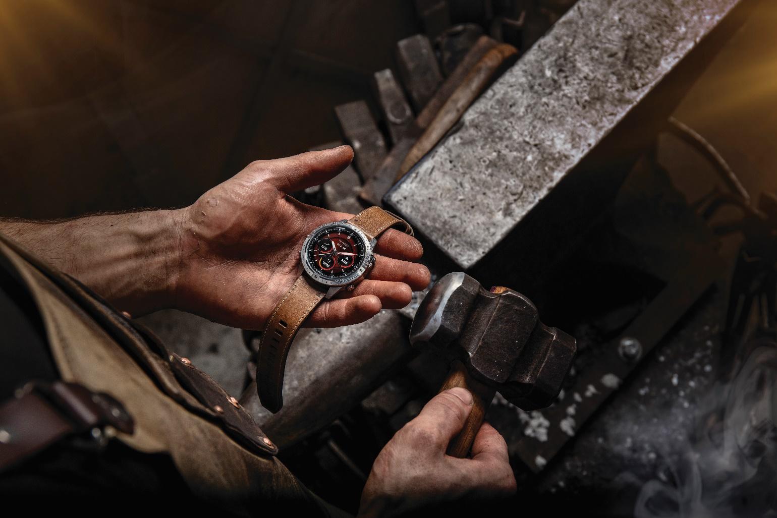 A close-up of a person's hand holding a watch

Description automatically generated