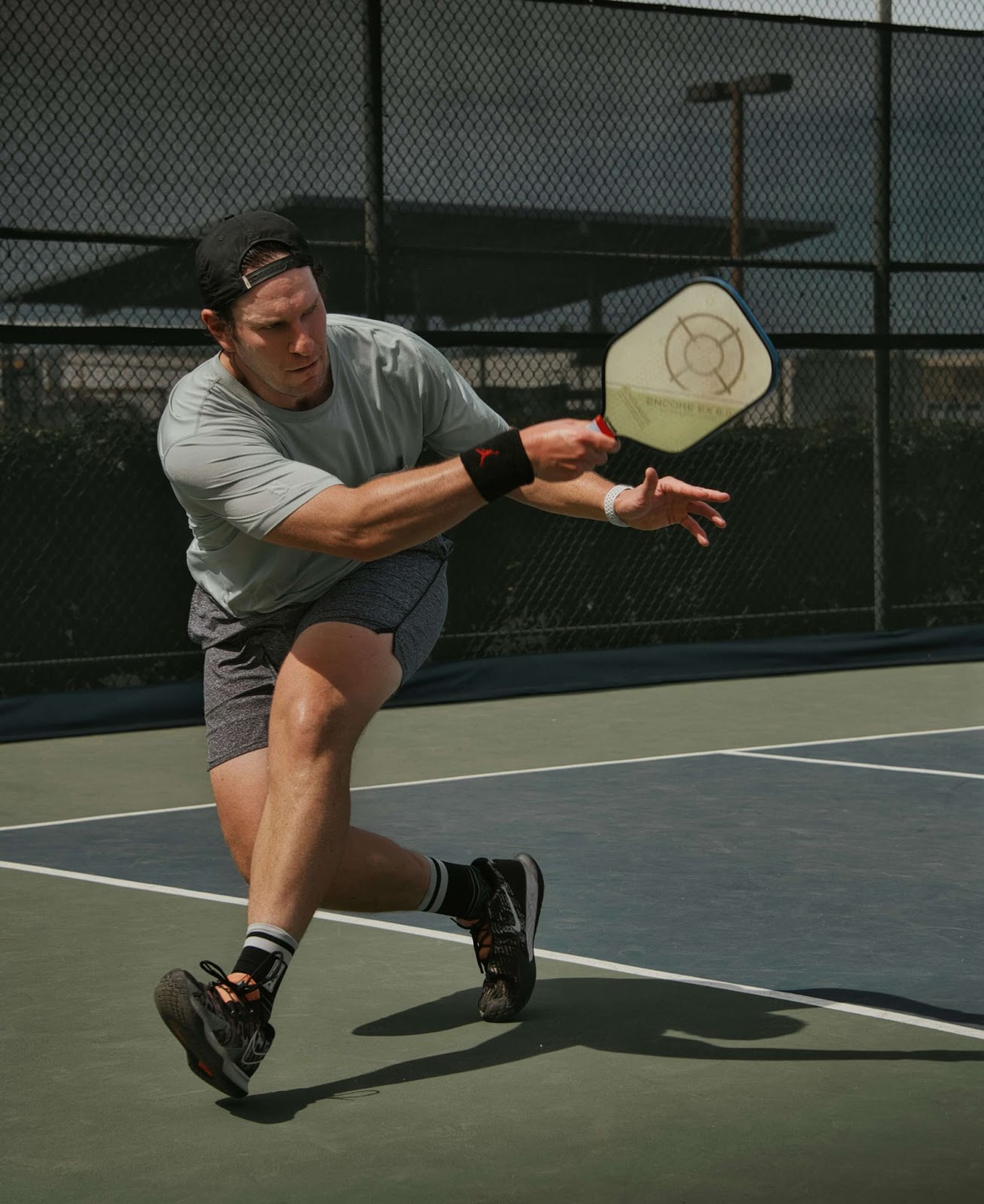 man playing pickleball