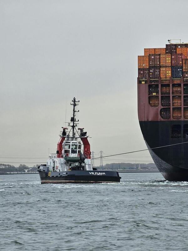 Large cargo ship loaded with containers en route to Europe, symbolizing international freight and maritime shipping services.
