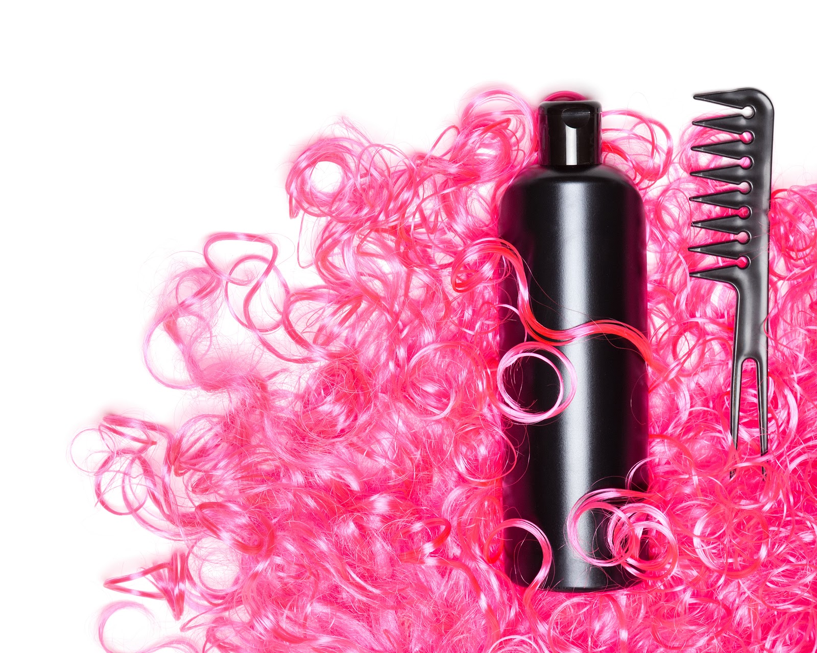 Pink wig hair with shampoo and wide-toothed comb