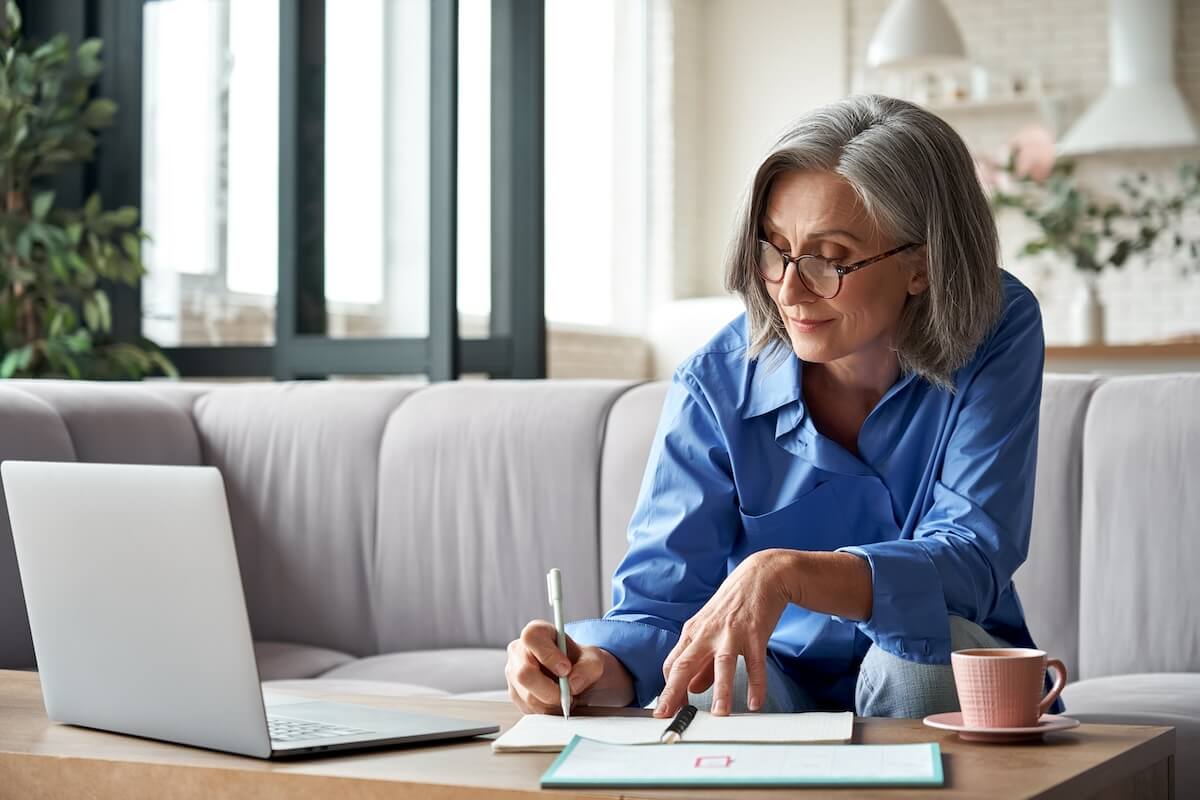 How does intermittent FMLA work: senior employee writing in a notebook
