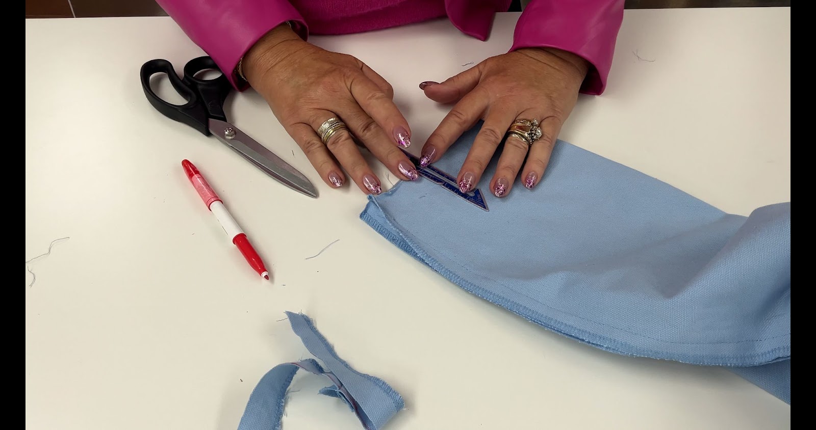 showing you how to mark the fold line on a pants hem