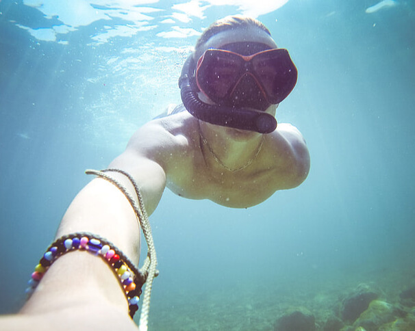 A man snorkeling.