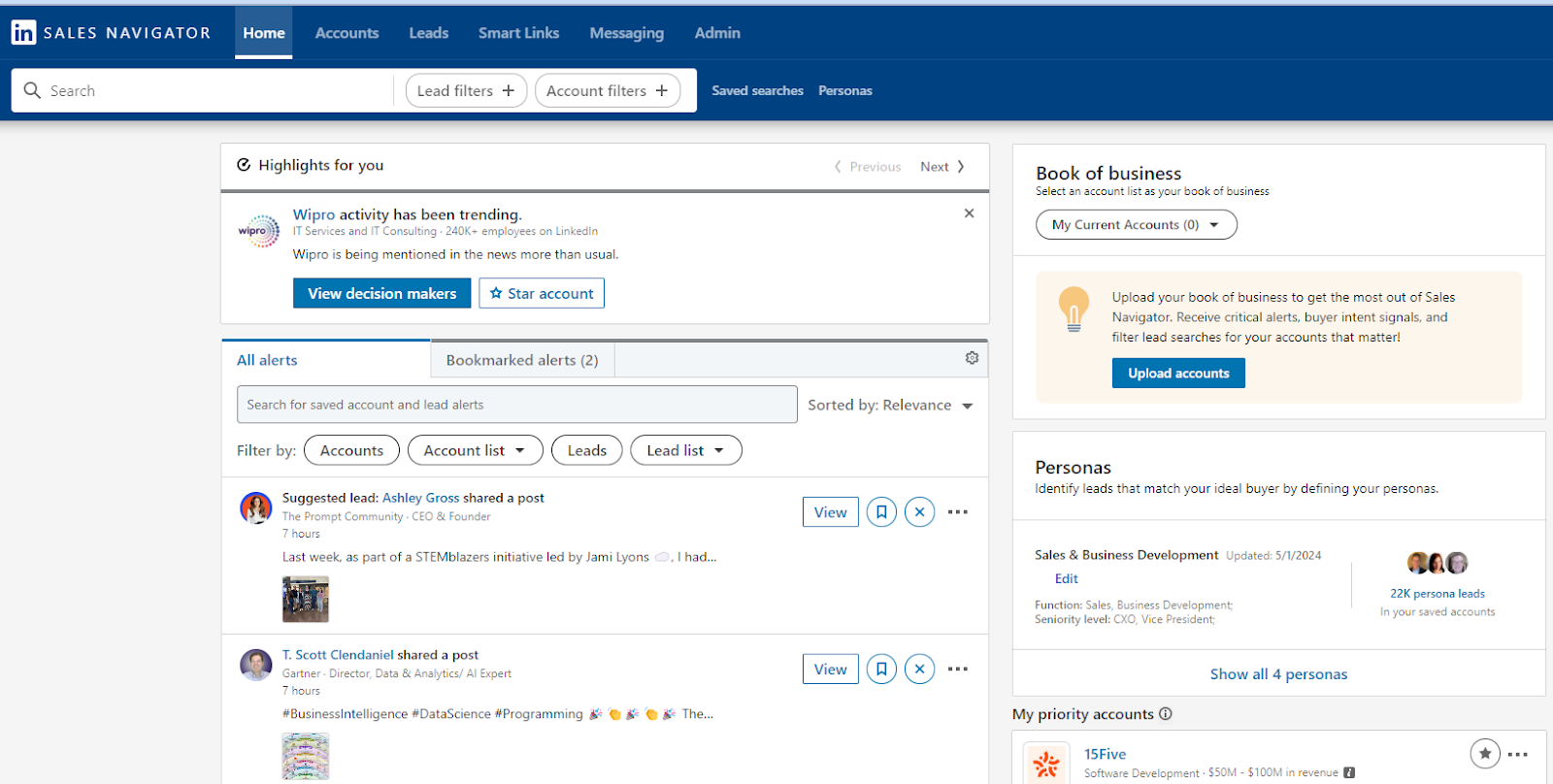 LinkedIn Sales Navigator home page showing highlights, alerts, book of business, personas, and priority accounts. The page includes an alert for trending activity from Wipro, suggested leads, and features for managing accounts and leads.