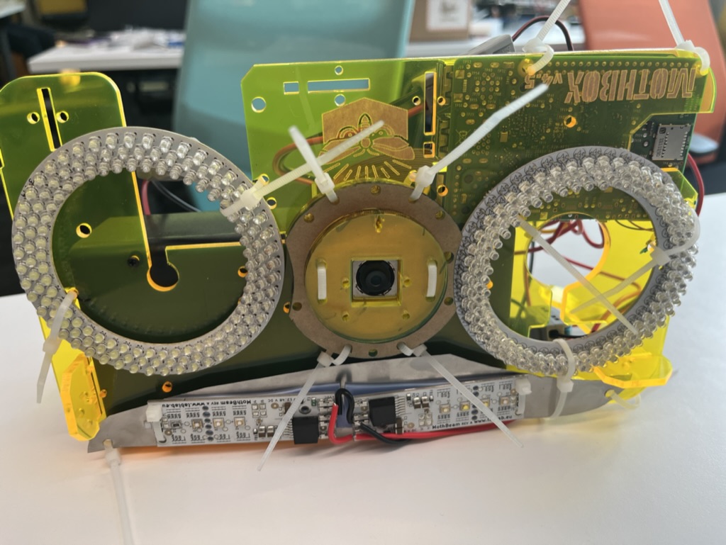 Photo of the front side of the Mothbox main board, with the two ring lights and Mothbeam attached.