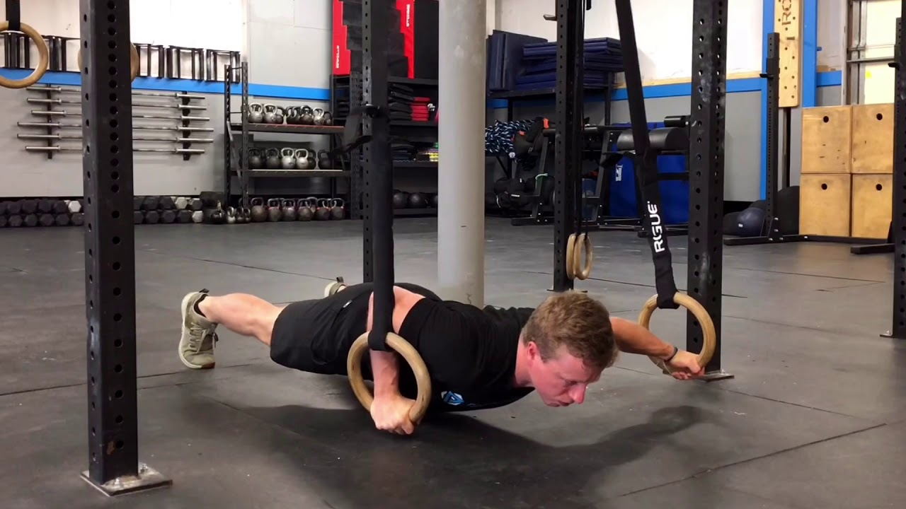 Gymnastic Rings Exercises - Ring Archer Push-Ups