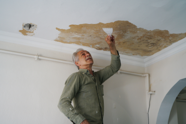 signs that your homes insulation isnt performing well ceiling with moisture damage custom built michigan