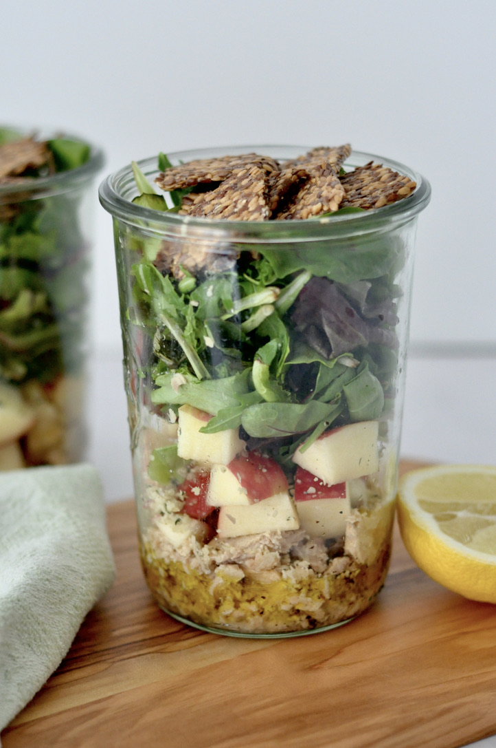 Salad in a jar with salmon apple mixed greens lemon gluten-free seed crackers - fertility meal plan and recipes for fertility - Wenatal