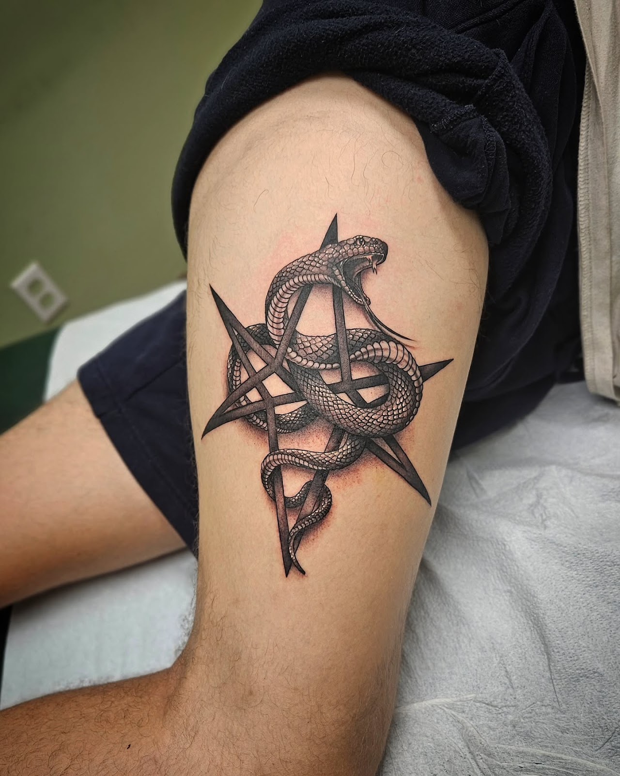 Snake Thigh Tattoo