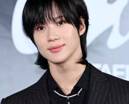 This contains an image of Taemin
