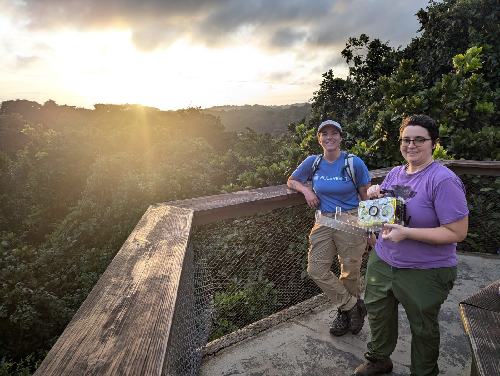 Bri and Kitty deploying a Mothbox at the top of the canopy tower