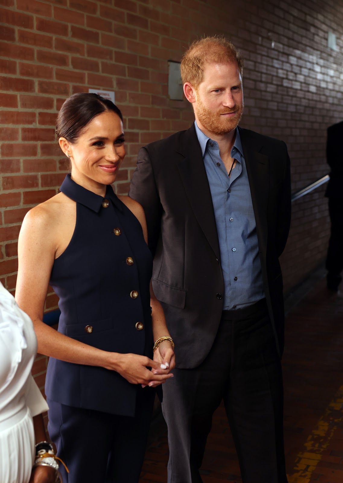 The Duchess and Duke of Sussex visiting a local charter school in Bogotá during their Colombia tour on August 15, 2024. | Source: Getty Images